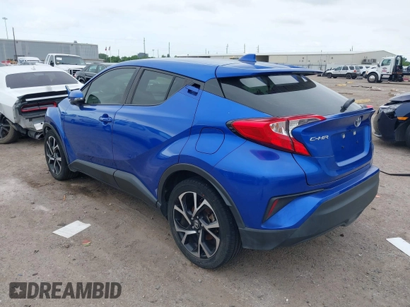 2020 Toyota C-HR LE with VIN JTNKHMBX7L1077218, listed as a IAAI auction lot 41994809 with 69,441 mi miles and . Bid and sale history available at DreamBid. Image 3.