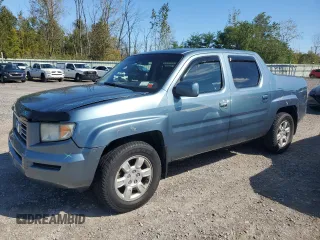 2006 Honda Ridgeline RTL with VIN 2HJYK16556H545357, listed as a Copart auction lot 70656694 with 153,668 mi miles and Salvage Title. Bid and sale history available at carsss.com. Image 1.