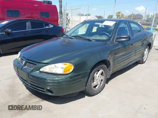 2000 Pontiac Grand Am SE1 with VIN 1G2NF52T0YM808611, listed as a IAAI auction lot 41943125 with 132,887 mi miles. Bid and sale history available at carsss.com. Image 2.