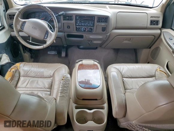 2000 Ford Excursion Limited с VIN 1FMNU42SXYEC01446, выставлен на аукционе Copart как лот 58023065 с пробегом 233 341 миль миль и Списание • Salvage title. История ставок и продаж доступна на DreamBid. Изображение 8.
