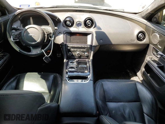 2013 Jaguar XJ with VIN SAJWA3HE9DMV49768, listed as a Copart auction lot 50339955 with 56,841 mi miles and Salvage Title. Bid and sale history available at DreamBid. Image 8.