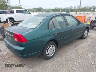 2001 Honda Civic LX with VIN 2HGES16511H546426, listed as a IAAI auction lot 42067246 with 192,560 mi miles. Bid and sale history available at carsss.com. Image 4.