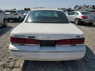 1996 Ford Crown Victoria LX with VIN 2FALP7466TX103371, listed as a Copart auction lot 70654804 with 160,147 mi miles and Non Repairable. Bid and sale history available at carsss.com. Image 6.