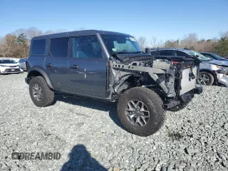 2023 Ford Bronco с VIN 1FMEE5DP6PLA81294, выставлен на аукционе Copart как лот 49076545 с пробегом 13 002 миль миль и На запчасти • Non repairable. История ставок и продаж доступна на DreamBid. Изображение 4.