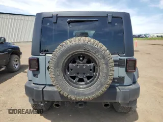 2014 Jeep Wrangler Unlimited Sahara with VIN 1C4BJWEG7EL228307, listed as a Copart auction lot 58663455 with 188,024 mi miles and Salvage title. Bid and sale history available at DreamBid. Image 6.