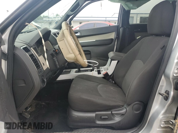 2010 Mercury Mariner with VIN 4M2CN8B7XAKJ30875, listed as a Copart auction lot 59964305 with 117,799 mi miles and Salvage title. Bid and sale history available at DreamBid. Image 7.