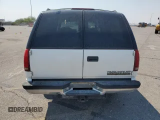 1994 Chevrolet Suburban z VIN 1GNGK26F1RJ444762, wystawiony jako Copart lot #86776674 z przebiegiem 354 375 mil mil oraz Szkoda całkowita • Salvage title. Historia ofert i sprzedaży dostępna na DreamBid. Obrazek 6.