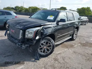 2015 GMC Yukon SLT with VIN 1GKS1BKC1FR539194, listed as a IAAI auction lot 41864424 with 1 mi miles. Bid and sale history available at carsss.com. Image 2.