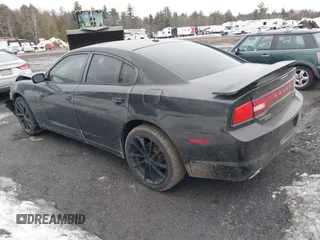 2014 Dodge Charger SXT Plus with VIN 2C3CDXJG2EH163049, listed as a IAAI auction lot 41634369 with 1 mi miles. Bid and sale history available at carsss.com. Image 3.