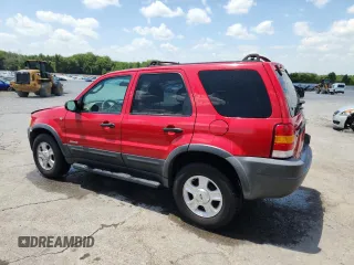2002 Ford Escape XLT Choice with VIN 1FMYU03132KA78142, listed as a Copart auction lot 65527755 with 149,326 mi miles and Salvage title. Bid and sale history available at DreamBid. Image 2.