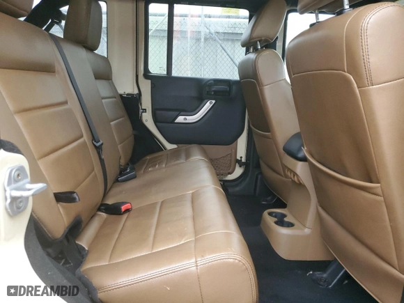 2011 Jeep Wrangler Unlimited Sahara with VIN 1J4BA5H19BL562457, listed as a Copart auction lot 44646965 with 184,155 mi miles and Salvage Title. Bid and sale history available at carsss.com. Image 11.