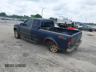 2003 Ford F-150 XL with VIN 1FTRX18W63NA57957, listed as a IAAI auction lot 42514779 with 406,771 mi miles and . Bid and sale history available at DreamBid. Image 3.