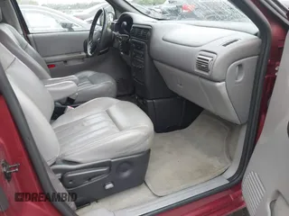 2003 Chevrolet Venture Warner Bros 1SE z VIN 1GNDX13E23D279465, wystawiony jako IAAI lot #41384442 z przebiegiem 124 033 mil mil oraz . Historia ofert i sprzedaży dostępna na DreamBid. Obrazek 5.