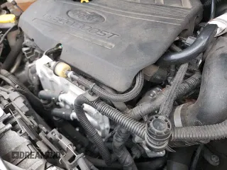 2018 Ford Escape SE z VIN 1FMCU9GD2JUB39549, wystawiony jako Copart lot #84175385 z przebiegiem 127 811 mil mil oraz Szkoda całkowita • Salvage title. Historia ofert i sprzedaży dostępna na DreamBid. Obrazek 14.