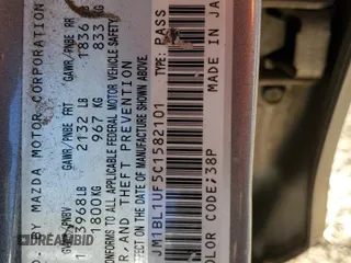 2012 Mazda 3 i Sport with VIN JM1BL1UF5C1582101, listed as a Copart auction lot 53322825 with 144,216 mi miles and Salvage Title. Bid and sale history available at DreamBid. Image 12.