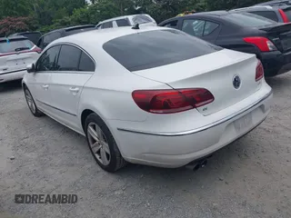 2014 Volkswagen CC R-Line with VIN WVWBP7AN7EE534565, listed as a IAAI auction lot 42477774 with 85,539 mi miles and . Bid and sale history available at DreamBid. Image 3.