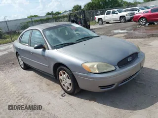 2007 Ford Taurus SE with VIN 1FAHP53U67A185949, listed as a IAAI auction lot 41928986 with 158,338 mi miles. Bid and sale history available at carsss.com. Image 1.