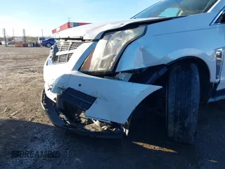 2012 Cadillac SRX Luxury Collection z VIN 3GYFNAE37CS576292, wystawiony jako IAAI lot #41048054 z przebiegiem 158 948 mil mil oraz . Historia ofert i sprzedaży dostępna na DreamBid. Obrazek 6.