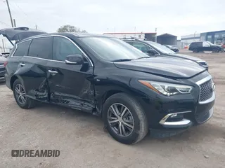 2020 Infiniti QX60 Pure with VIN 5N1DL0MN0LC527050, listed as a IAAI auction lot 41734032 with 71,204 mi miles and . Bid and sale history available at DreamBid. Image 1.