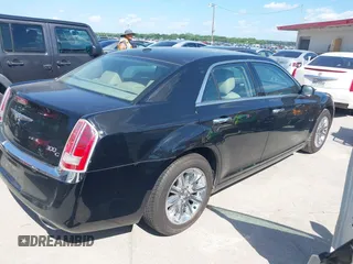 2013 Chrysler 300 with VIN 2C3CCAET5DH650221, listed as a IAAI auction lot 42071848 with 1 mi miles. Bid and sale history available at carsss.com. Image 4.
