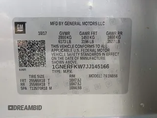 2018 Chevrolet Traverse LS z VIN 1GNERFKW7JJ145166, wystawiony jako IAAI lot #42161304 z przebiegiem 104 165 mil mil oraz . Historia ofert i sprzedaży dostępna na DreamBid. Obrazek 9.