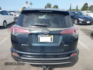 2017 Toyota RAV4 XLE with VIN JTMWFREV3HD105878, listed as a IAAI auction lot 41889338 with 75,784 mi miles. Bid and sale history available at carsss.com. Image 16.