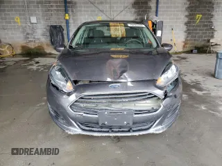 2017 Ford Fiesta SE z VIN 3FADP4BJ9HM165523, wystawiony jako Copart lot #70295532 z przebiegiem 91 318 mil mil oraz Szkoda całkowita • Salvage title. Historia ofert i sprzedaży dostępna na DreamBid. Obrazek 5.