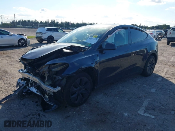 2025 Tesla Model Y Long Range with VIN 7SAYGDED4SF226776, listed as a IAAI auction lot 41514317 with 1,636 mi miles and . Bid and sale history available at DreamBid. Image 18.