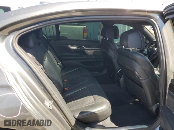 2017 BMW 7 Series 740i with VIN WBA7E2C55HG739108, listed as a Copart auction lot 53304715 with 114,510 mi miles and Salvage title. Bid and sale history available at DreamBid. Image 10.