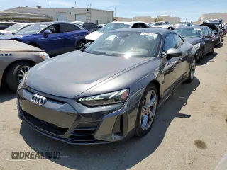2022 Audi e-tron GT Prestige z VIN WAUDJBFW9N7004503, wystawiony jako Copart lot #57742104 z przebiegiem 27 457 mil mil oraz Szkody całkowita. Historia ofert i sprzedaży dostępna na DreamBid. Obrazek 1.