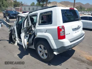 2014 Jeep Patriot Latitude with VIN 1C4NJRFB4ED549734, listed as a IAAI auction lot 42543649 with Not provided miles and . Bid and sale history available at DreamBid. Image 3.