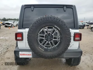 2023 Jeep Wrangler Sport S with VIN 1C4HJXDN3PW522353, listed as a Copart auction lot 86645234 with 17,562 mi miles and Salvage Title. Bid and sale history available at DreamBid. Image 6.