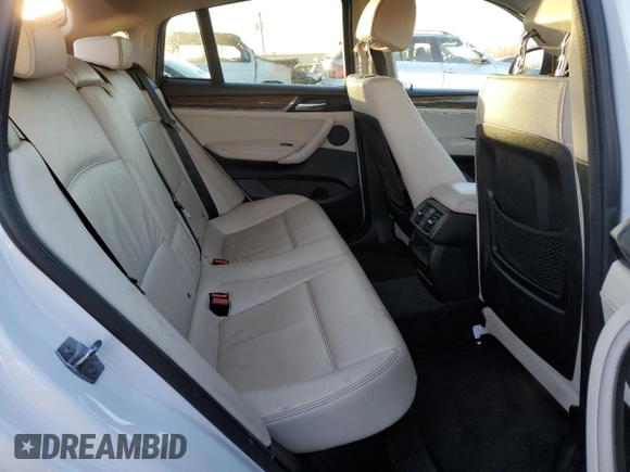 2015 BMW X4 xDrive28i with VIN 5UXXW3C58F0M88241, listed as a Copart auction lot 66591742 with 95,658 mi miles. Bid and sale history available at carsss.com. Image 6.