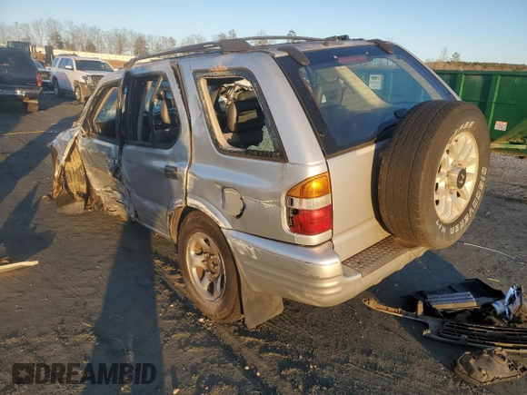 2000 Honda Passport LX with VIN 4S6CK58W7Y4416423, listed as a Copart auction lot 87708165 with 0 mi miles and Salvage Title. Bid and sale history available at carsss.com. Image 2.