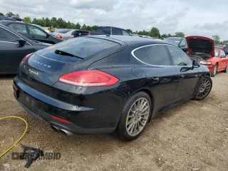 2015 Porsche Panamera S E-Hybrid z VIN WP0AD2A76FL041627, wystawiony jako Copart lot #63190924 z przebiegiem 88 860 mil mil oraz Szkody całkowita. Historia ofert i sprzedaży dostępna na DreamBid. Obrazek 3.