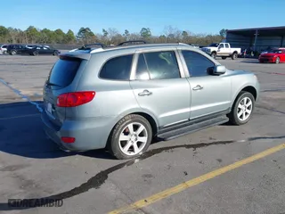 2009 Hyundai Santa Fe SE with VIN 5NMSH13E09H259020, listed as a IAAI auction lot 41236834 with 180,776 mi miles. Bid and sale history available at carsss.com. Image 4.