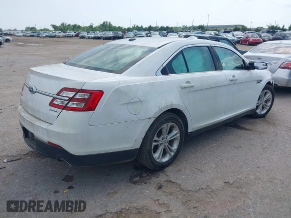 2017 Ford Taurus SE with VIN 1FAHP2D8XHG140446, listed as a IAAI auction lot 42000340 with 128,057 mi miles and . Bid and sale history available at DreamBid. Image 4.