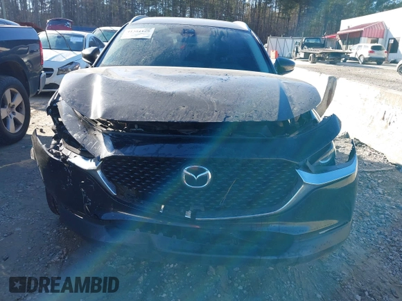 2023 Mazda CX-30 2.5 S Preferred Package with VIN 3MVDMBCM9PM519070, listed as a IAAI auction lot 41351129 with 76,711 mi miles. Bid and sale history available at carsss.com. Image 12.