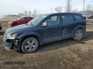 2014 Dodge Journey SE Plus with VIN 3C4PDCAB3ET107669, listed as a Copart auction lot 48662635 with 210,519 mi miles and Salvage Title. Bid and sale history available at DreamBid. Image 1.