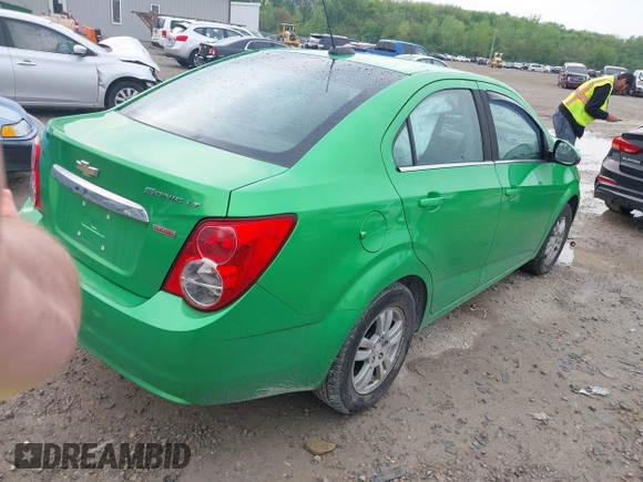2015 Chevrolet Sonic LT with VIN 1G1JC5SB8F4168860, listed as a IAAI auction lot 42163278 with 102,855 mi miles and . Bid and sale history available at DreamBid. Image 4.