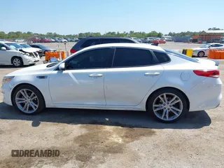 2016 Kia Optima LX with VIN KNAGT4L32G5085128, listed as a IAAI auction lot 42016728 with 259,218 mi miles. Bid and sale history available at carsss.com. Image 14.