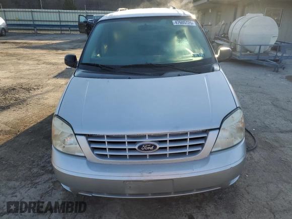 2005 Ford Freestar SE z VIN 2FMDA51635BA24020, wystawiony jako Copart lot #47605725 z przebiegiem 112 563 mil mil oraz Szkody całkowita. Historia ofert i sprzedaży dostępna na DreamBid. Obrazek 5.