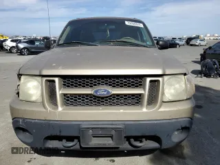2002 Ford Explorer Sport Value z VIN 1FMYU60E62UB91081, wystawiony jako Copart lot #75688824 z przebiegiem 229 382 mil mil oraz Szkody całkowita. Historia ofert i sprzedaży dostępna na DreamBid. Obrazek 5.