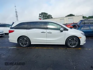 2022 Honda Odyssey Elite with VIN 5FNRL6H91NB040519, listed as a IAAI auction lot 41992662 with 34,001 mi miles and . Bid and sale history available at DreamBid. Image 13.