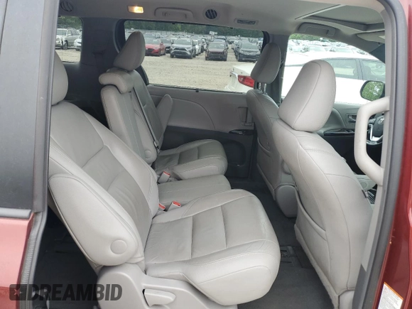 2015 Toyota Sienna XLE with VIN 5TDYK3DC1FS648469, listed as a Copart auction lot 57471975 with 118,567 mi miles and Non repairable. Bid and sale history available at DreamBid. Image 11.