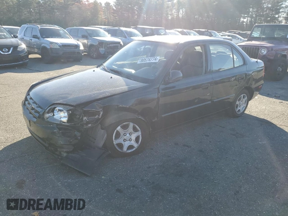 2005 Hyundai Accent GLS z VIN KMHCG45C15U662362, wystawiony jako Copart lot #80574774 z przebiegiem 122 898 mil mil oraz Szkoda całkowita • Salvage title. Historia ofert i sprzedaży dostępna na DreamBid. Obrazek 1.