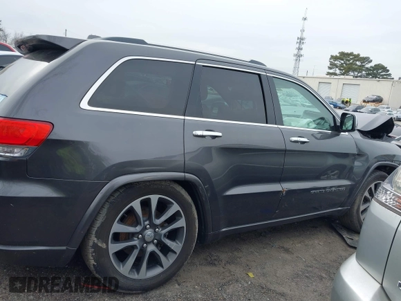 2017 Jeep Grand Cherokee Overland with VIN 1C4RJFCG8HC772837, listed as a IAAI auction lot 41304895 with 71,338 mi miles. Bid and sale history available at carsss.com. Image 12.
