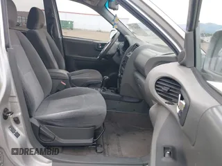 2003 Hyundai Santa Fe GLS z VIN KM8SC73DX3U357525, wystawiony jako IAAI lot #42436777 z przebiegiem 228 844 mil mil oraz . Historia ofert i sprzedaży dostępna na DreamBid. Obrazek 5.