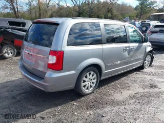 2013 Chrysler Town & Country Touring with VIN 2C4RC1BG8DR775222, listed as a IAAI auction lot 41080043 with 248,000 mi miles. Bid and sale history available at carsss.com. Image 4.