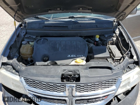 2012 Dodge Journey SXT z VIN 3C4PDDBG0CT345864, wystawiony jako Copart lot #55453875 z przebiegiem 142 444 mil mil oraz Szkoda całkowita • Salvage title. Historia ofert i sprzedaży dostępna na DreamBid. Obrazek 12.